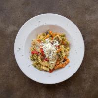 Greek Fusilli · Kalamata and green olives, capers, roasted red peppers, artichoke hearts and feta cheese in ...