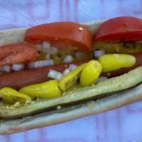 Chicago Dog · Comes with mustard, relish, onions, tomatoes, chili peppers, pickle and celery salt.