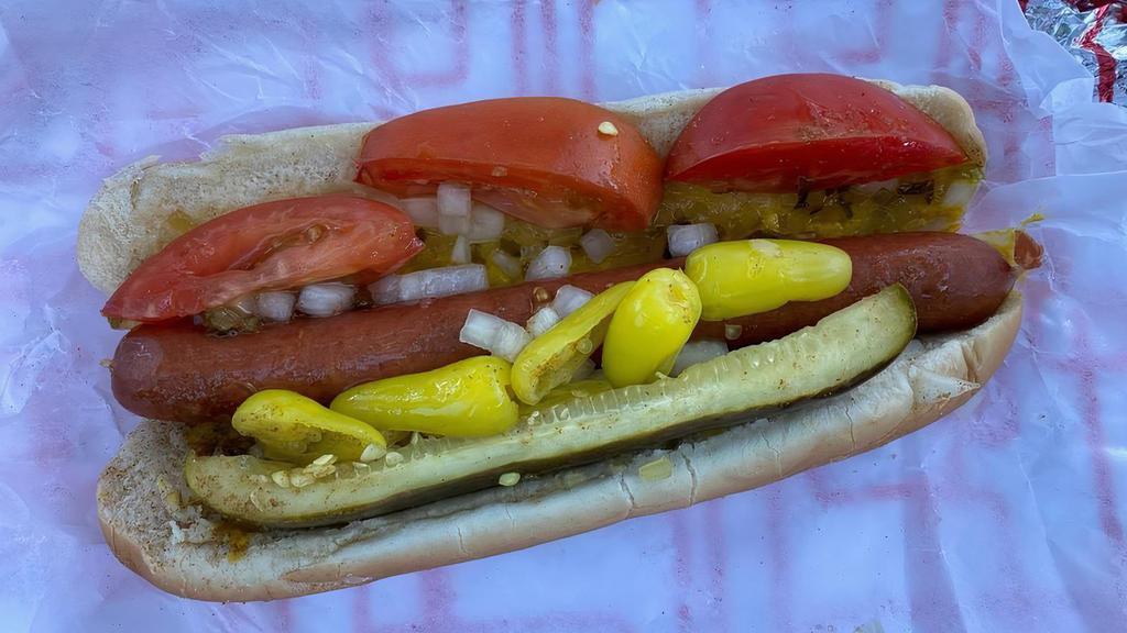 Chicago Dog · Comes with mustard, relish, onions, tomatoes, chili peppers, pickle and celery salt.