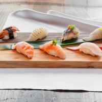 Sushi Lover Platter · Chef’s choice of 10 pieces nigiri - comes with soup & salad.