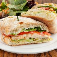 Grilled Chicken Sandwich · Lemon-thyme marinated chicken breast served with avocado, Pepper Jack cheese and fresh tomat...