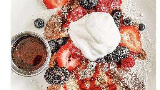 French Toast Platter  · small plater serves 8-10 people
Brioche french toast bread dipped in vanilla custard & served  with seasonal berries & sweet berry coulis .