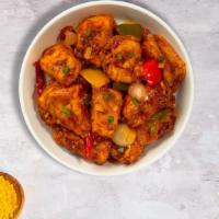 Paneer Chili Pleaser · Marinated cubes of cottage Vegan cheese, bell peppers, onions & tomatoes marinated in an Ind...