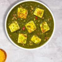Shimmering In Saag Paneer · Cubes of fresh Vegan cottage cheese cooked in a spinach gravy infused with garlic, ginge, an...