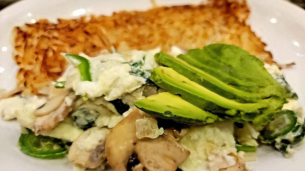 Vegan Scramble · Bell peppers, jalapeños, onions, spinach, egg white and avocado.