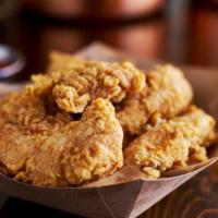 Golden Chicken Tenders (5) · Golden and crisp on the outside and juicy on the inside chicken tenders.