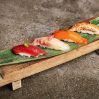 Chef's 4-Piece Nigiri Tasting · Four pieces of sushi selected by the chef. Types of fish may vary depending on season, but w...