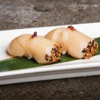 Pirikara Hotate · Scallop dusted with our house 7-spice blend and seared, Hokkaido