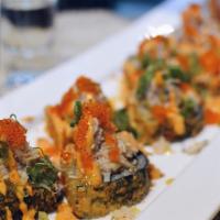 Volcano · Deep fried albacore,
chopped jalapeno, red onion
top with spicy blue crab,
unagi and spicy c...