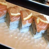 49er Roll · Blue crab, avocado top with
salmon and thinly slice lemon