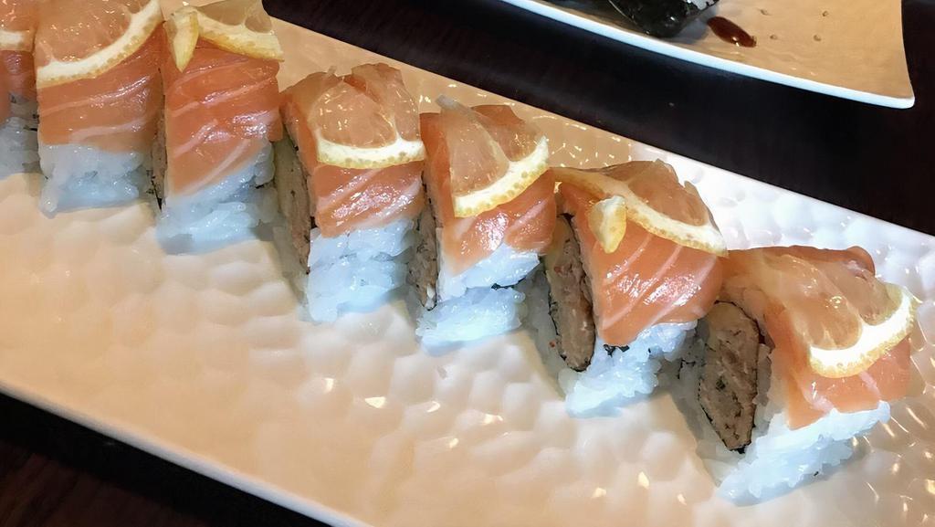 49er Roll · Blue crab, avocado top with
salmon and thinly slice lemon