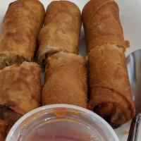1. Golden Rolls (3)  · Onion and garlic. Traditional fried eggless roll, filled w/ taro, cabbage, carrot and sweet ...