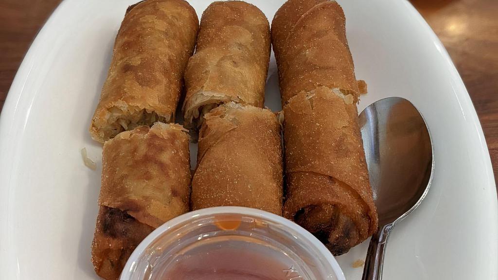 1. Golden Rolls (3)  · Onion and garlic. Traditional fried eggless roll, filled w/ taro, cabbage, carrot and sweet potato.