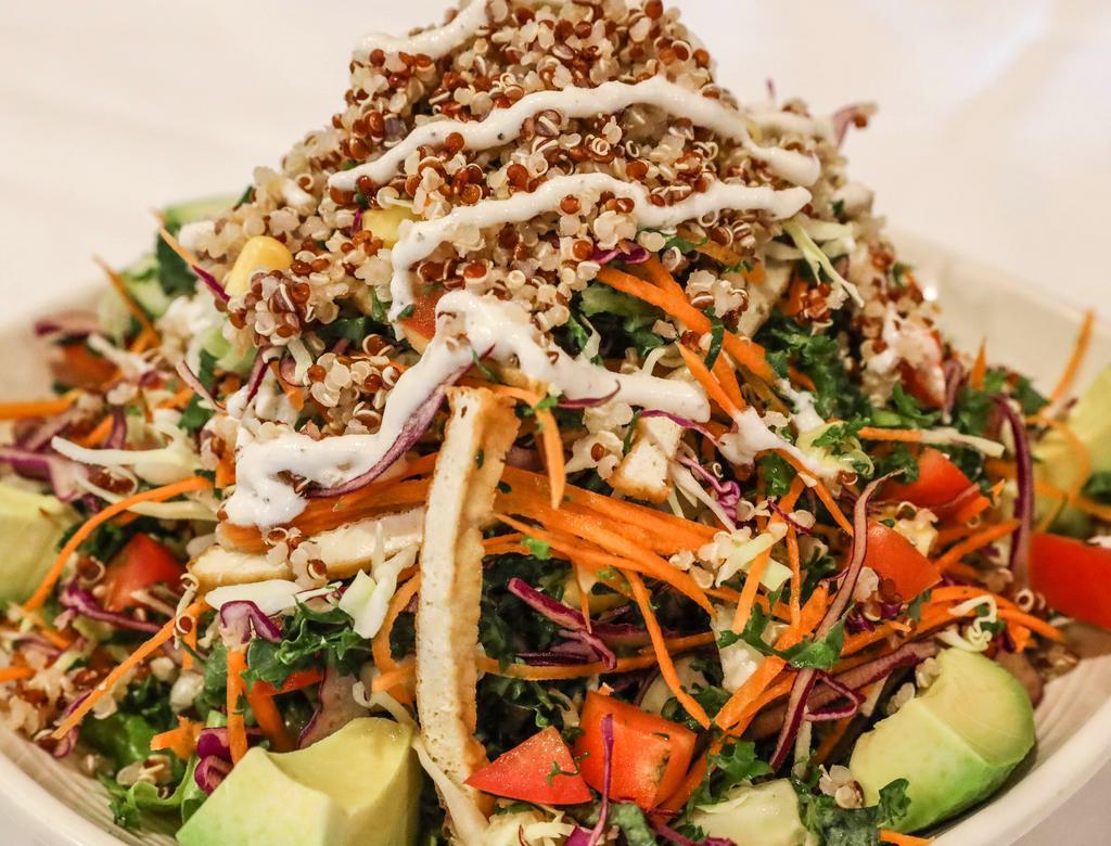 12. Quinoa Salad · Gluten-free. Raw kale, carrot, red cabbage, tomato, cucumber, tofu, corn, avocado, and sunflower seed in raw almond sauce. Served w/vinaigrette sauce.