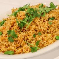 R28. Curry Fried Rice · Spicy.  Gluten-free. Fried white rice w/ tofu, soy protein, peas, carrot, corn, in coconut c...