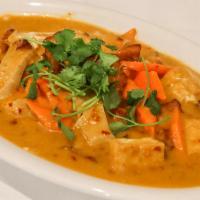 36. Spicy Sweet Potato Curry · Spicy. Soy chicken, tofu, sweet potato, carrot, in coconut curry sauce.