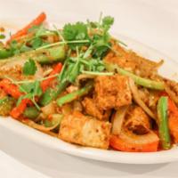 34. Lemongrass Tofu · Spicy. Gluten-free, onion and garlic. Fried onion, red and green bell pepper, and org. tofu ...