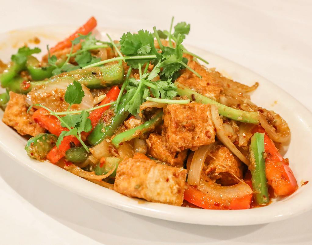 34. Lemongrass Tofu · Spicy. Gluten-free, onion and garlic. Fried onion, red and green bell pepper, and org. tofu in lemongrass sauce.