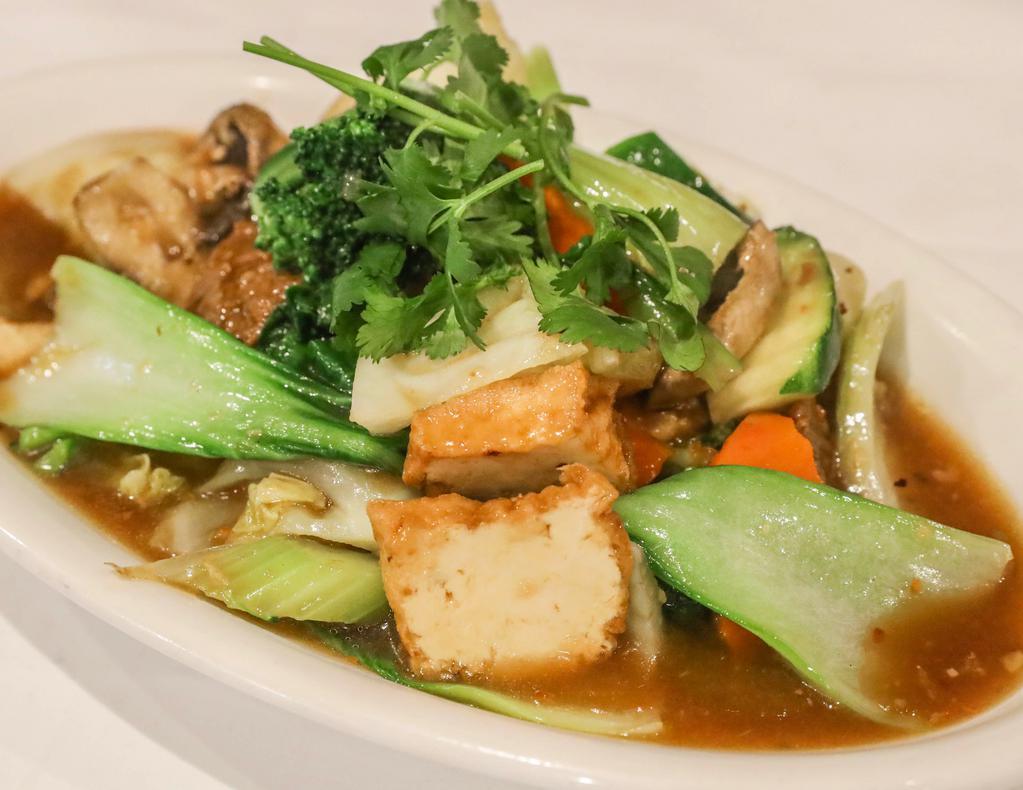 29. Vegetables Deluxe · Gluten-free, onion and garlic. Combination of fresh vegetables ( broccoli, bok choy, cabbage, celery, zucchini, carrot, mushroom) stir-fried w/ org. tofu, soy protein in garlic sauce.