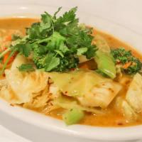33. Curry Vegetables · Spicy. Gluten-free. Mixed fresh vegetables stir-fried in coconut curry sauce.