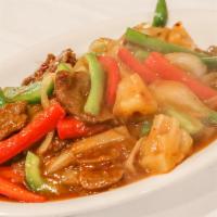 39. Spicy Szechuan · Spicy. Onion and garlic. Soy beef, onion, red and green bell peppers, pineapple, cooked in s...