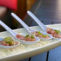 **Hamachi Spoons (4 Pcs) · Hamachi spoons served with ponzu sauce, green onions and sesame seeds.