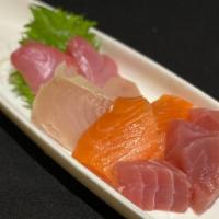 **Sashimi Combo (8pc) · Yellowfin tuna, albacore, yellowtail, salmon (2 pcs each).