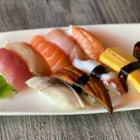 **Nigiri Combo Deluxe (10pc) · Yellowfin tuna, albacore, yellowtail, salmon, cooked shrimp, eel, mackerel, octopus, tobiko,...