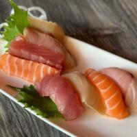 **Sushi & Sashimi Combo (8pc) · Yellowfin tuna, albacore, yellowtail, salmon (1 pc each nigiri, 1 pc each sashimi).