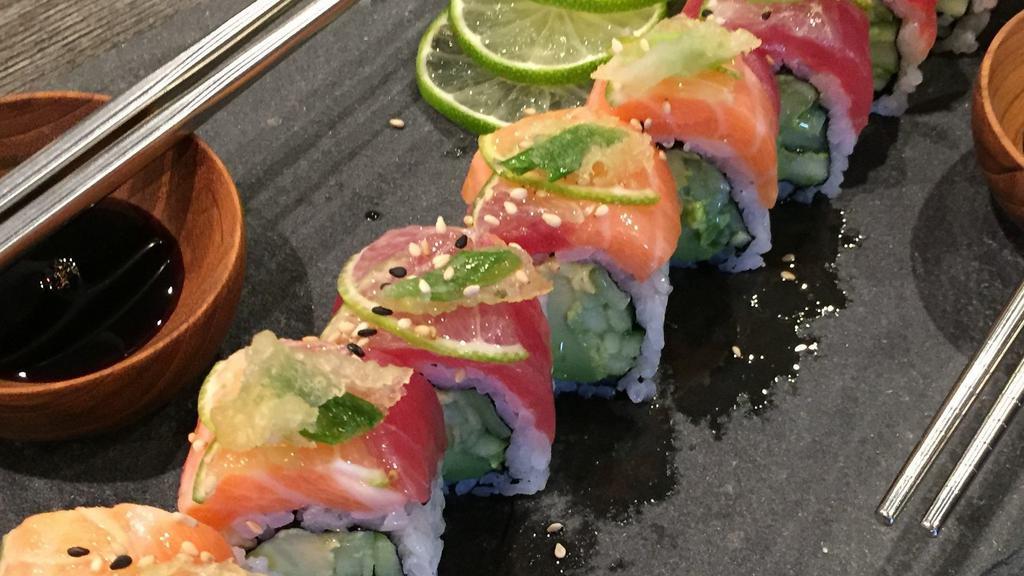 **Lime & Dine · avocado, cucumber, topped with salmon, tuna, lime, ponzu sauce, Persian lime olive oil, sesame seeds