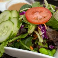 Side Salad · Mixed greens, tomato, cucumber, edamame served with a sesame-miso dressing (on the side)