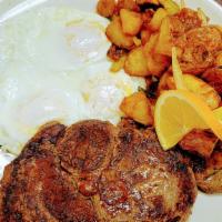 Steak And Eggs · Ten oz. Ribeye steak and two fried eggs served with potatoes and toast.