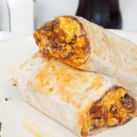 Veg Breakfast Burrito · Onions ,peppers, tomatoes, garlic, potatoes, spinach, eggs and cheese.