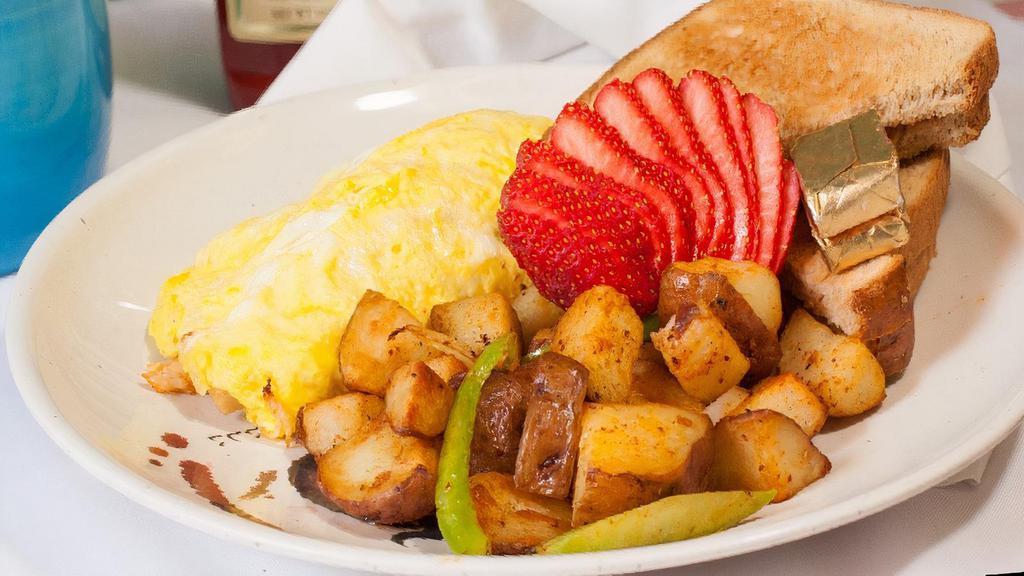 Mushrooms Omelet · Mushrooms, onions, spinach, tomatoes and jack cheese served with house potatoes or fresh fruit and toast.