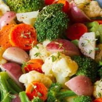 Side Sautéed Vegetable · Broccoli, onions, peppers, potatoes, carrots, zucchini, and spinach, .