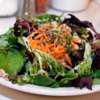 Dinner Salad · Vegan, Gluten-free. Mixed greens with shredded carrots, garbanzo beans, tomato, garlic in ho...