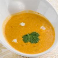#153 Mulgataney Soup · Chicken and lentil soup.