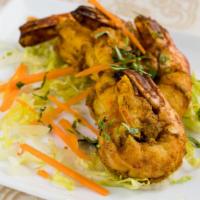 #32. Tandoori Shrimps · Jumbo prawns marinated overnight in spices and herbs.