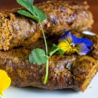 #294 Seekh Kabab · Spiced, minced lamb molded on skewers, then broiled in the tandoor.