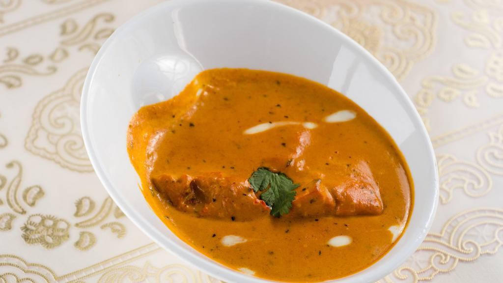 Chicken Curry · A traditional dish cooked with boneless chicken, onion, garlic, ginger, tomatoes and curry spices.