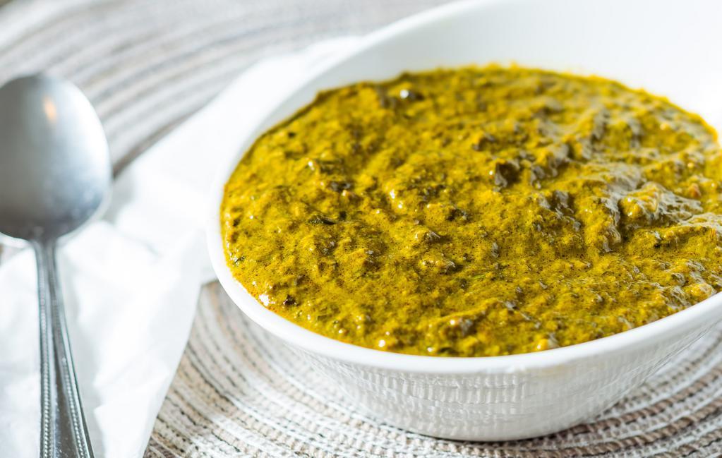 Palak Paneer · Pureed spinach and homemade cheese with a touch of creamy sauce.