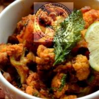 Aloo Gobi Masala · Potato and cauliflower cooked with spices.