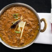 Dal Makhni · Kidney beans and lentils flavored with ginger, garlic and cooked in cream over slow heat.