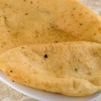 Bhature · Crispy deep fried soft bread.