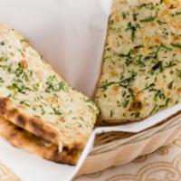 Onion Kulcha · Leavened bread with onion and spices.