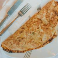 Keema Naan · Leavened bread stuffed with chicken and spices.