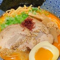 Spicy Miso Ramen · Wheat noodle in spicy dashi (bonito and seaweed) broth flavored with miso, chicken and, pork...