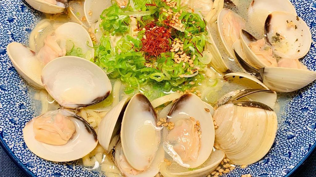 HAMAGURI RAMEN · Umami filled littleneck clams harvested from Asia with wheat noodles, buttery dashi broth(seaweed and bonito) with note of garlic, topped with green onion sesame seeds and red string pepper.<br />Please be aware clams may contain sand, as well as shell fragments.