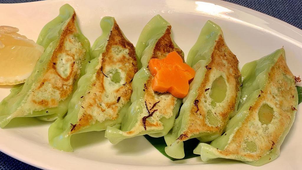 Green Gyoza · Dumplings filled with edamame, onion, and tofu served with sesame sauce