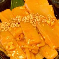 Spicy Menma · Young bamboo shoots marinated in hot chili oil, garlic, and Japanese sanshyo spice.
